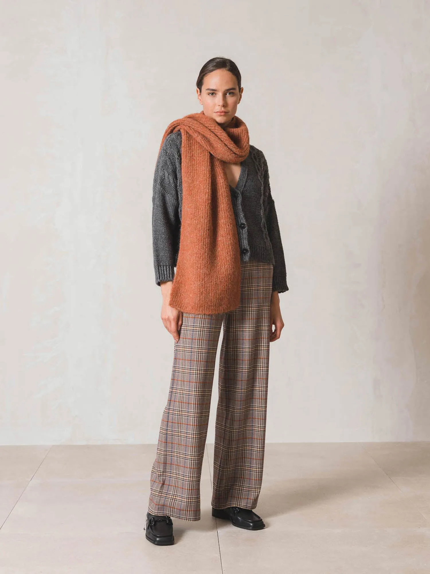 Sure! To optimize the title of an e-commerce product for INDI & COLD scarves, you want it to be descriptive, appealing, and include keywords that customers might use when searching for scarves. Heres a suggestion:

INDI & COLD Womens Soft Cashmere Blend Scarf - Stylish, Cozy, and Versatile Accessory

This title uses descriptive modifiers to highlight the material (Soft Cashmere Blend), the target audience (Womens), and key selling points (Stylish, Cozy, and Versatile Accessory).