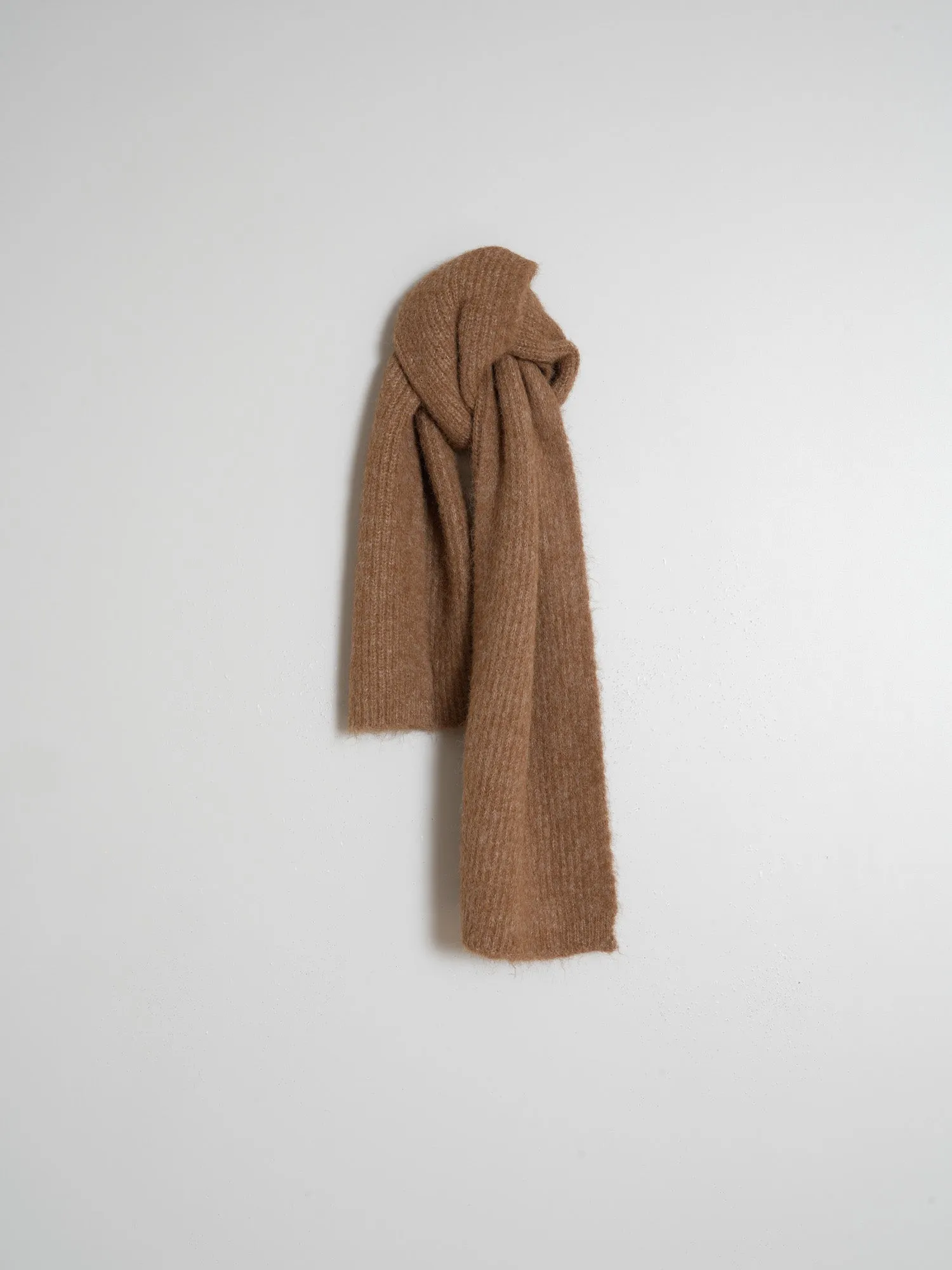 Sure! To optimize the title of an e-commerce product for INDI & COLD scarves, you want it to be descriptive, appealing, and include keywords that customers might use when searching for scarves. Heres a suggestion:

INDI & COLD Womens Soft Cashmere Blend Scarf - Stylish, Cozy, and Versatile Accessory

This title uses descriptive modifiers to highlight the material (Soft Cashmere Blend), the target audience (Womens), and key selling points (Stylish, Cozy, and Versatile Accessory).