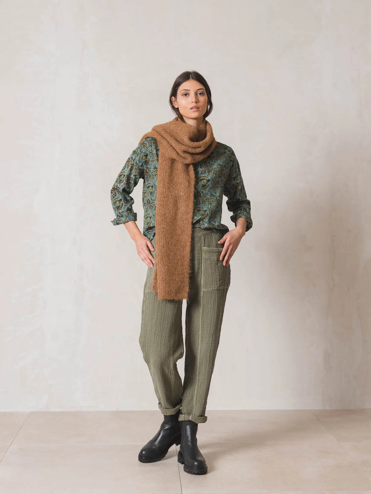 Sure! To optimize the title of an e-commerce product for INDI & COLD scarves, you want it to be descriptive, appealing, and include keywords that customers might use when searching for scarves. Heres a suggestion:

INDI & COLD Womens Soft Cashmere Blend Scarf - Stylish, Cozy, and Versatile Accessory

This title uses descriptive modifiers to highlight the material (Soft Cashmere Blend), the target audience (Womens), and key selling points (Stylish, Cozy, and Versatile Accessory).