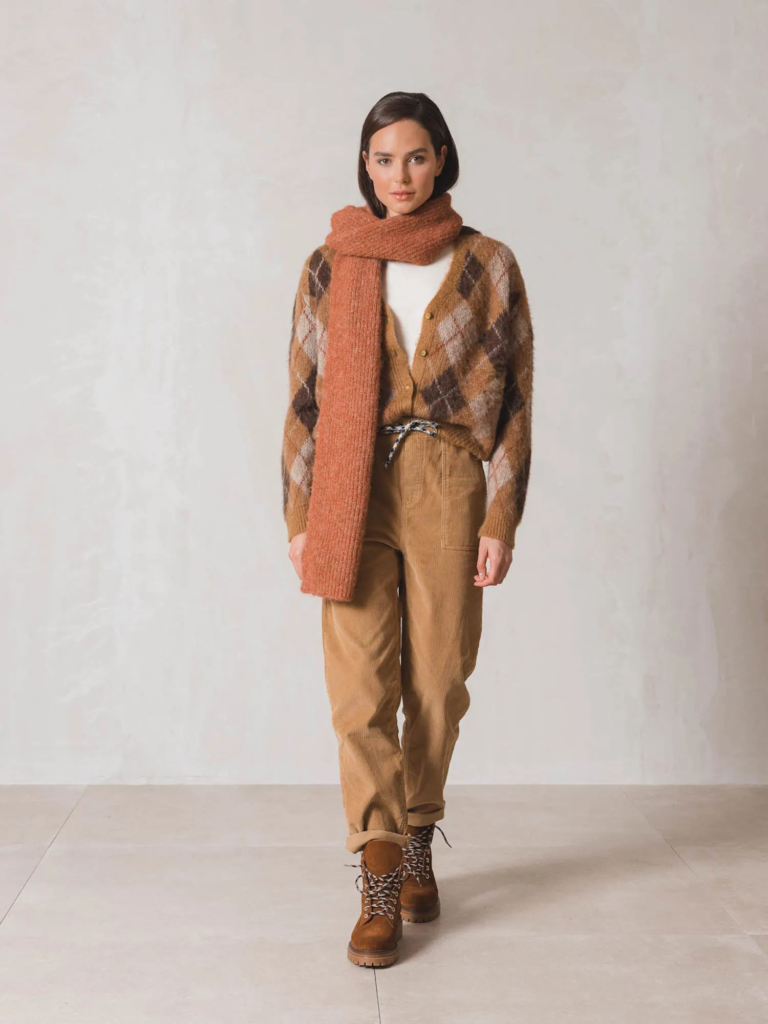 Sure! To optimize the title of an e-commerce product for INDI & COLD scarves, you want it to be descriptive, appealing, and include keywords that customers might use when searching for scarves. Heres a suggestion:

INDI & COLD Womens Soft Cashmere Blend Scarf - Stylish, Cozy, and Versatile Accessory

This title uses descriptive modifiers to highlight the material (Soft Cashmere Blend), the target audience (Womens), and key selling points (Stylish, Cozy, and Versatile Accessory).