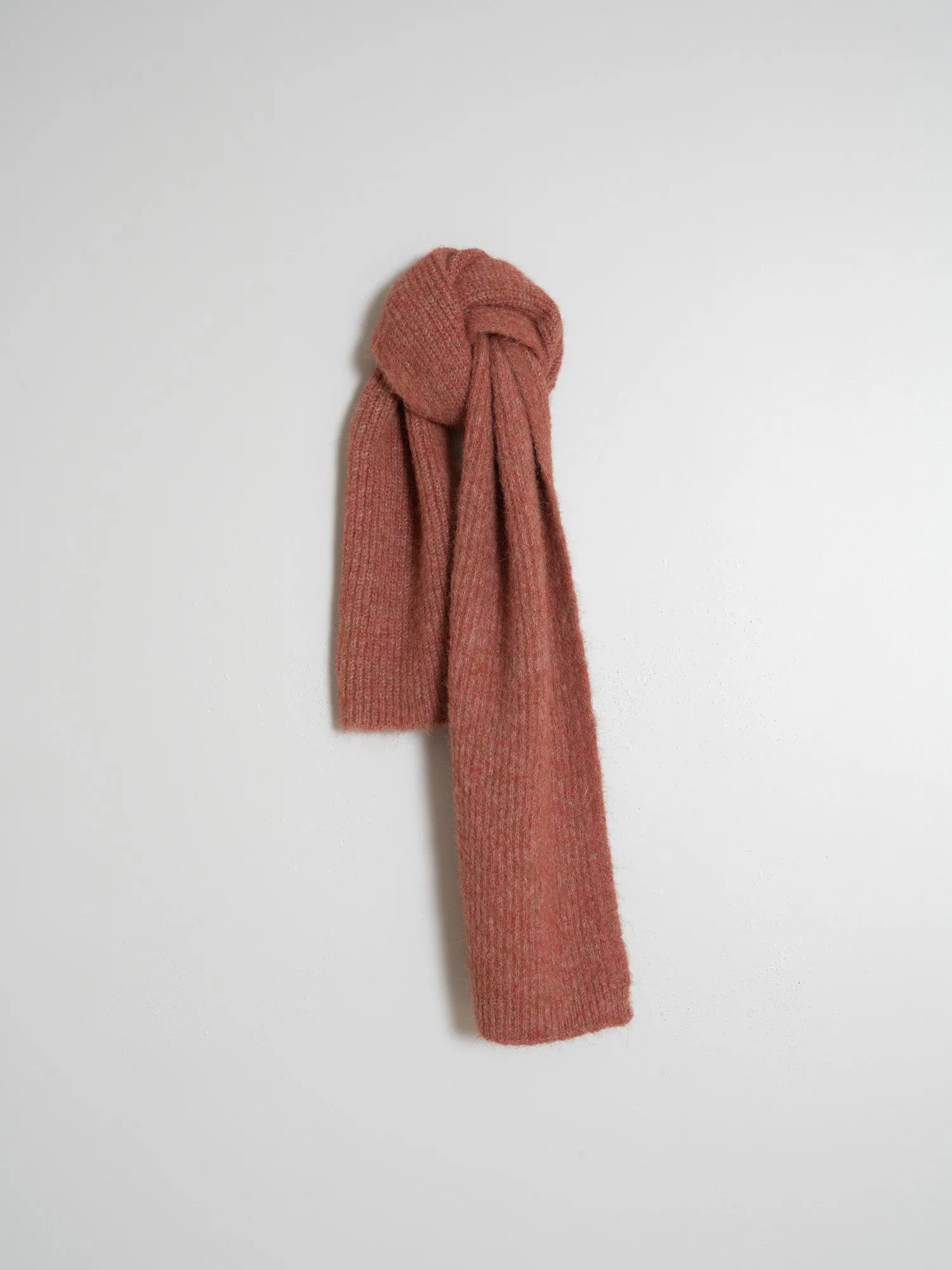 Sure! To optimize the title of an e-commerce product for INDI & COLD scarves, you want it to be descriptive, appealing, and include keywords that customers might use when searching for scarves. Heres a suggestion:

INDI & COLD Womens Soft Cashmere Blend Scarf - Stylish, Cozy, and Versatile Accessory

This title uses descriptive modifiers to highlight the material (Soft Cashmere Blend), the target audience (Womens), and key selling points (Stylish, Cozy, and Versatile Accessory).